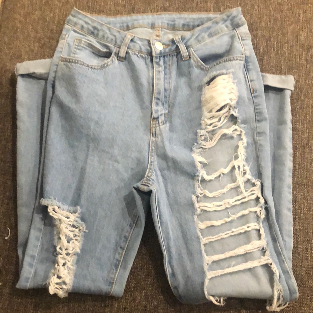 Light blue ripped jeans